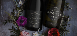 Nuthouse Pinot Noir and Knudsen Vineyard Brut with flowers